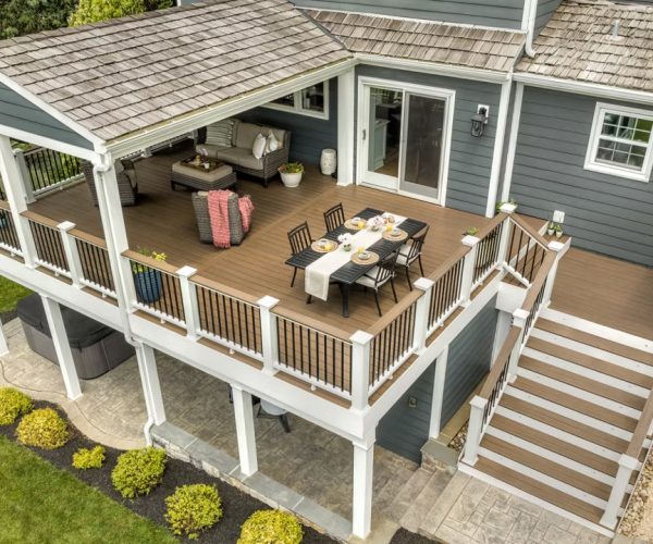 trn-leesburg-004-sr-trn-railing-wt-cocktail-stairs-table-wide-aerial_Large